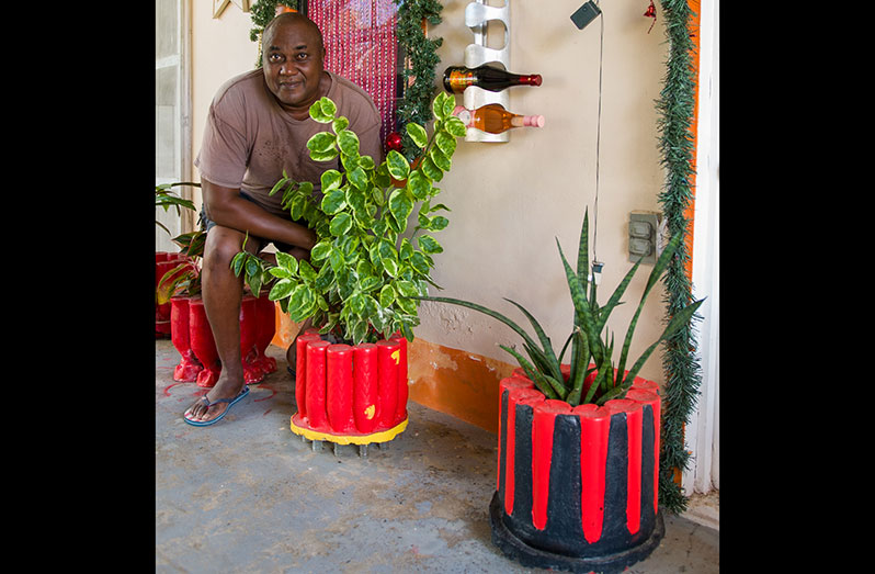 Klim Abrams with his plant pot invention (Delano Williams photos)