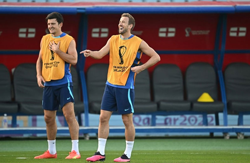 Harry Kane (right) says England are more confident than they were four years ago (AFP)