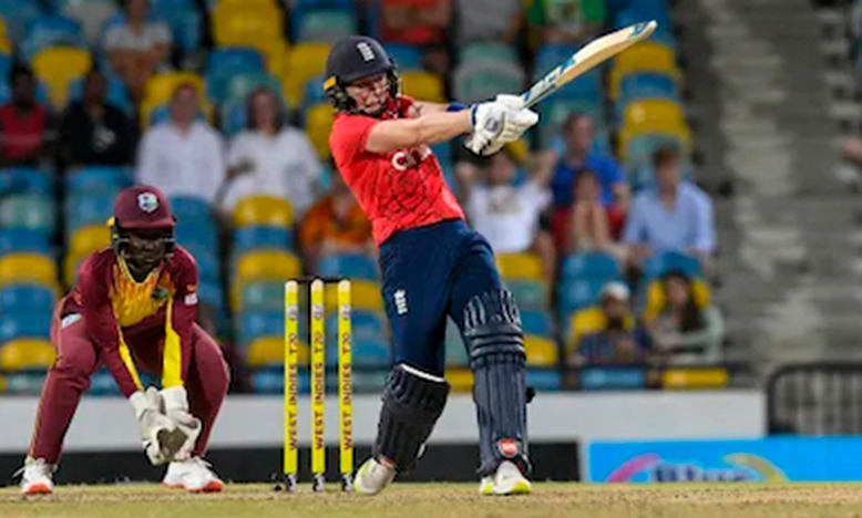 West Indies Women’s wicket-keeper, Kycia Knight, (left) watches Heather Knight pull during her innings of 43. (CWI Media photo)