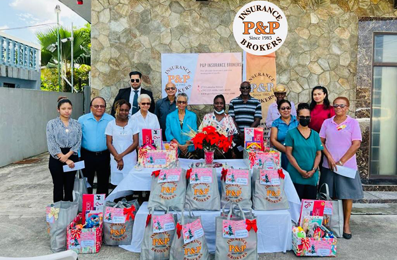 Recipients flanked by Mr. Vikash Panday and Ms. Jaya Panday