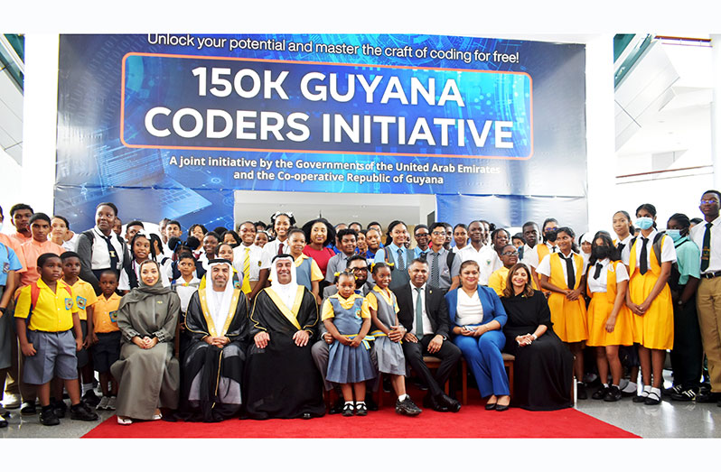 (At centre) President Dr. Irfaan Ali; Minister within the Ministry of Public Works, Deodat Indar; Education Minister Priya Manickchand; along with other officials, pupils and students who were in attendance at the Guyana Coders Initiative launched on Wednesday. Also photographed are representatives from the United Arab Emirates (UAE). (Carl Croker photos)