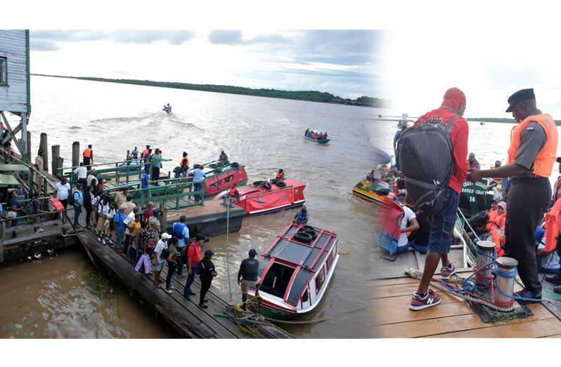 Members of the Guyana Defence Force and MARAD were able to prevent chaos by successfully getting passengers to form orderly lines to board boats that were
in place to ferry them between the Stabroek Wharf and the Vreed-en-Hoop Stelling (Elvin Carl Croker photos)