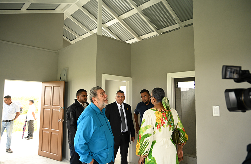Prime Minister of St Vincent and the Grenadines Dr Ralph Gonsalves, inspects one of the many homes in the Great Diamond Low-income Housing Development in the presence of Housing and Water Minister, Collin Croal; Minister of Local Government and Regional Development, Nigel Dharamlall and Director of Projects, Central Housing and Planning Authority, Omar Narine
