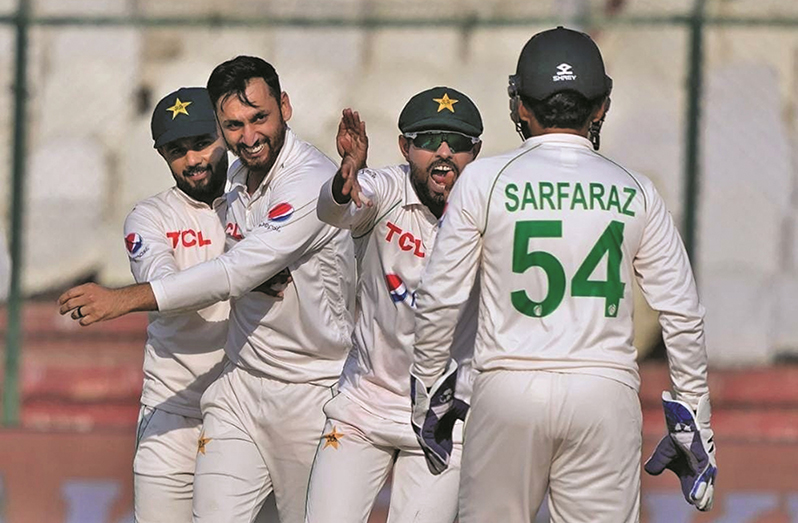 Agha Salman celebrates after having Devon Conway caught behind (Associated Press)