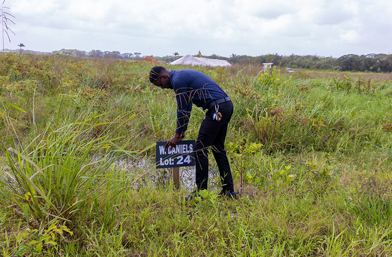 Cummings Lodge, East Coast Demerara landowner Wynton Daniels marks his plot