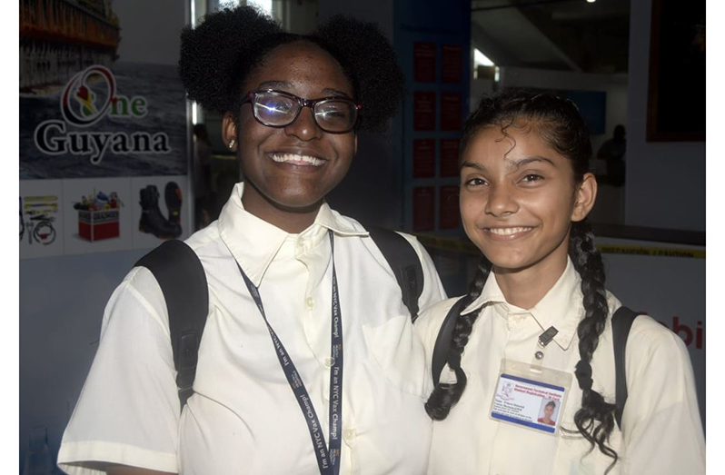 Princess Baboolall (right) with her friend Adrianna Edghilo (Adrian Narine photo)