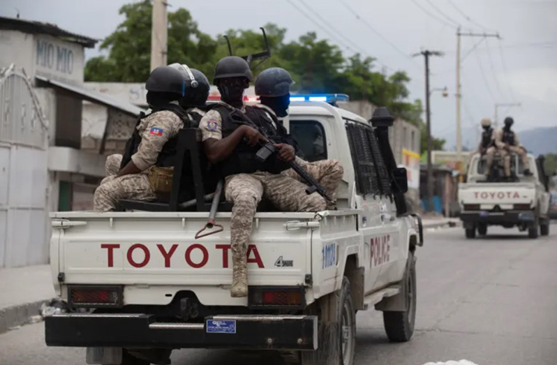 Haitian security forces have struggled to contend with gangs that have taken control of large swathes of the capital city, Port-au-Prince [File: Odelyn Joseph/AP Photo]