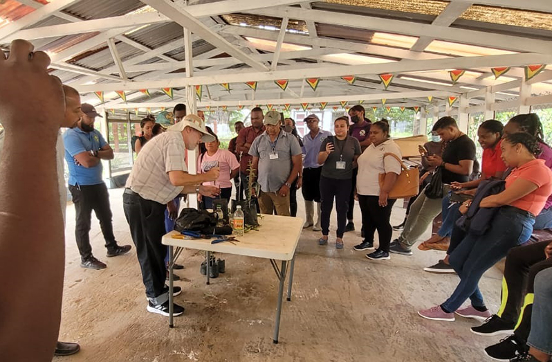 Extension officers being trained in cherry production