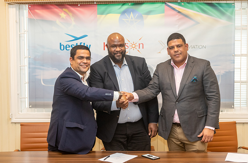 (From left) Nuno Pereira and Morry Davis for BFK Aviation after signing the agreement with Ronaldo Alphonso, MD Xen Aviation