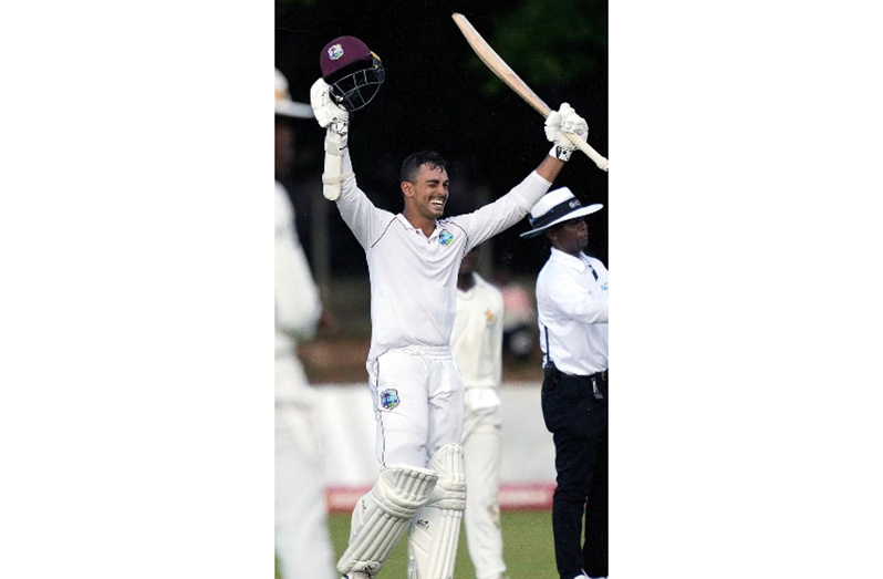 Tagenarine Chanderpaul celebrates his double hundred on Monday’s third day of the opening Test against Zimbabwe.