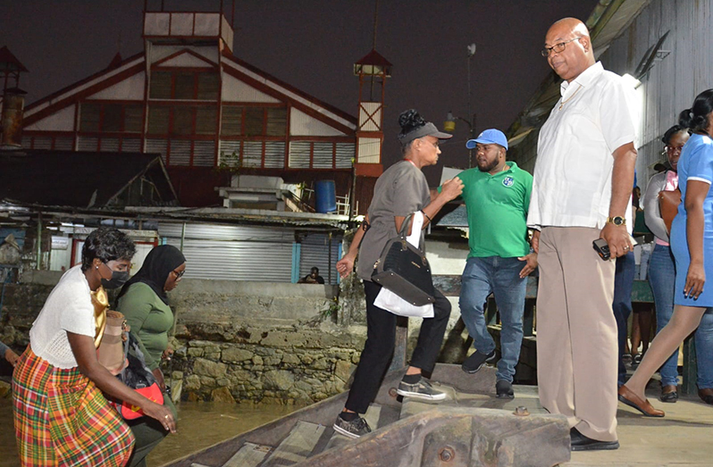 Minister of Public Works, Juan Edghill at the Georgetown Ferry Stelling on Sunday night (Department of Public Information photo)