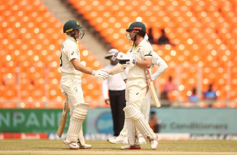 Australia batted throughout day five to earn a draw but India won the series 2-1.