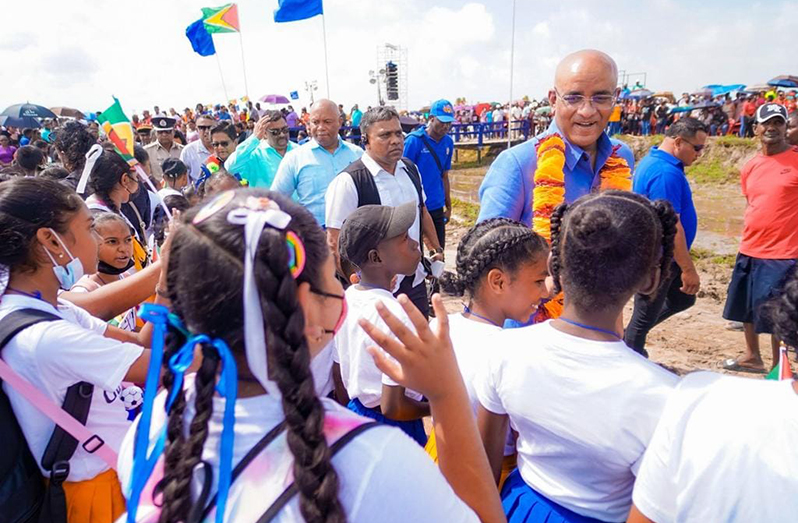 Vice-President, Dr Bharrat Jagdeo is greeted by children of Region Six on Friday