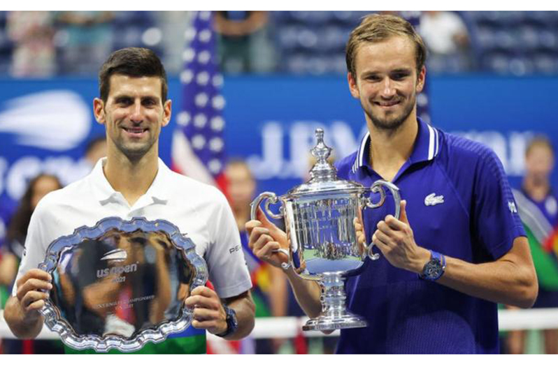 Novak Djokovic(left) lost to Daniil Medvedev in the 2021 final but was unable to compete last year because of his vaccination status.