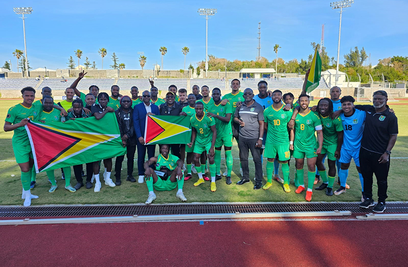 Team Guyana takes a photo after the win that saw them qualify for the CONCACAF Gold Cup preliminary round.