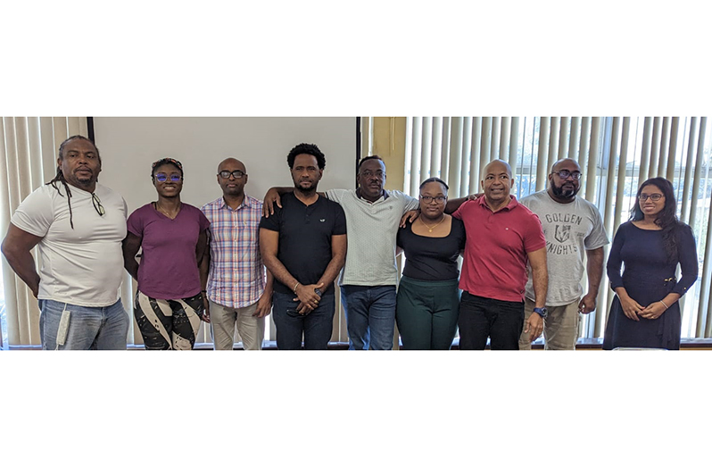 New GAPLF President, Franklin Wilson (centre) flanked by Executive Committee Members from left, Roger Rogers, Keisha Abrigo, Maxwell Denny, Denroy Livan, Zanele Chase, Henry Chase, Farouk Abdool and Returning Officer, Mrs. Vidushi Persaud-McKinnon