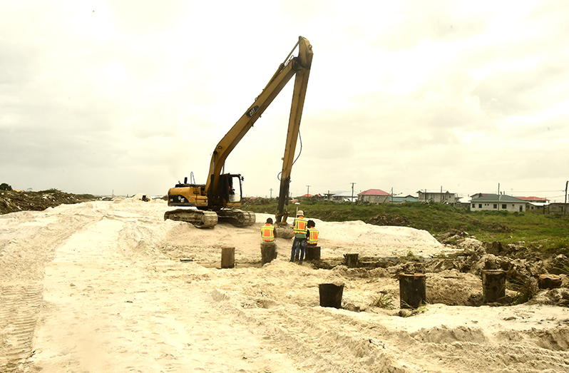 Works ongoing on the road to be completed by the end of March (Adrian Narine Photo)