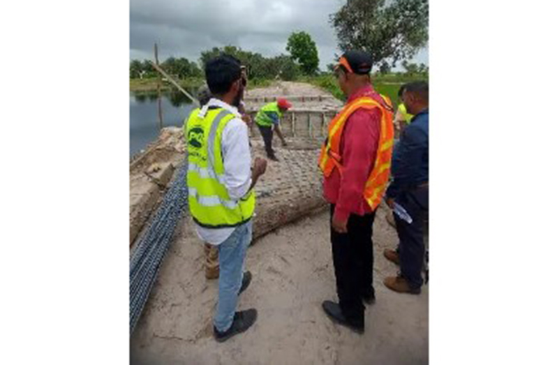 Minister of Public Works Bishop Juan Edghill inspecting an infrastructural project in Region Two (Ministry of Public Works photo)