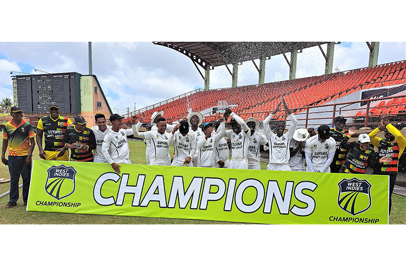 We are the champions! GHE members celebrate being crowned champions of the West Indies championship after beating Leewards Islands Hurricaanes at the Providence  Stadium. (Sean Devers photo)