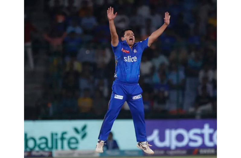 Chawla, Rohit star as Mumbai
earn first points in last-ball thriller