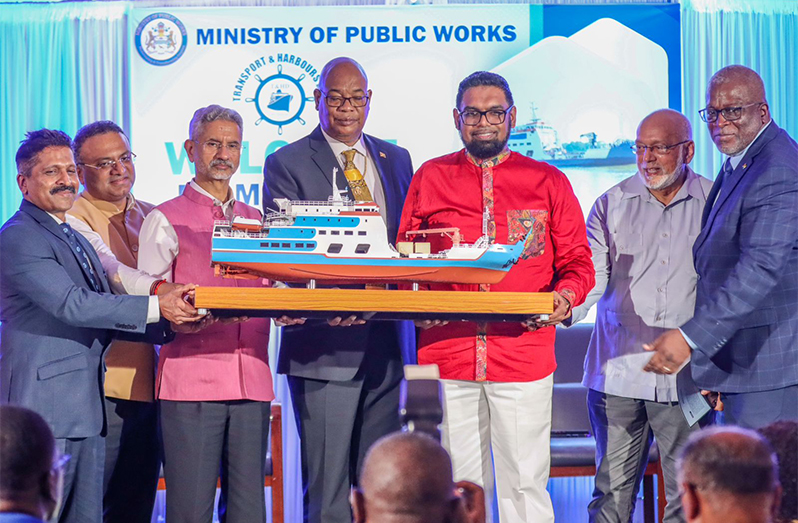 From right: President, Dr Irfaan Ali; Minister of Public Works, Juan Edghill and Indian Minister of External Affairs, Dr. Subrahmanyam Jaishankar with other officials holding a replica of MV Ma Lisha (DPI photo)