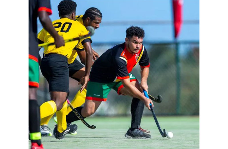 Samuel Woodroofe on the go for Guyana against Barbados (PAHF photo)