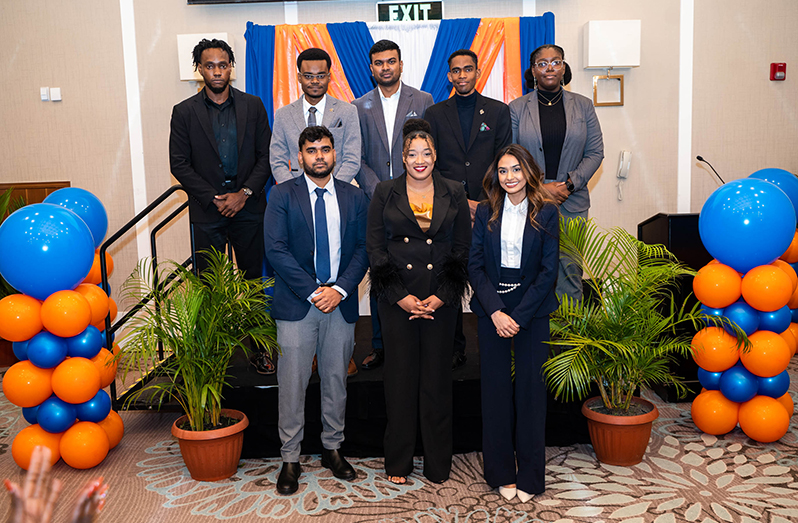 The eight young engineers, Daniel Troyer, Malik Lewis, Andy Sattan, Raymond Luckhoo, Tanisha Selby, Kishaun Lall, Paula Ceres and Maryam Nasir at the graduation ceremony