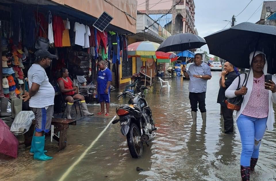 Regional Vice-Chairman Zamal Hussain speaking with affected vendors /business owners on Pitt Street on Wednesday