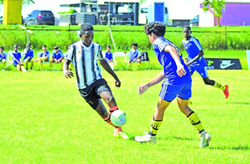 Action in the ExxonMobil U-14 Boys and Girls football tournament