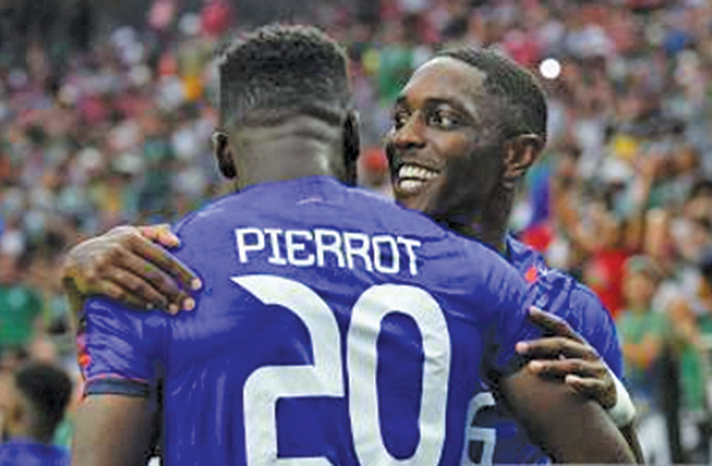 Israel-based forward Frantzdy Pierrot celebrates his goal on Sunday.
