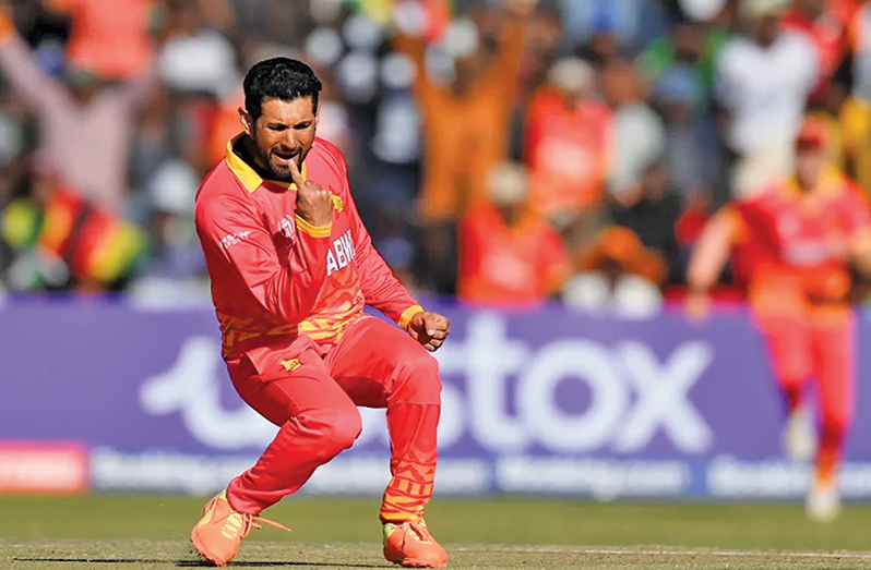 Player of the match  Sikandar Raza is pumped up after dismissing Shai Hope (ICC/Getty Images)