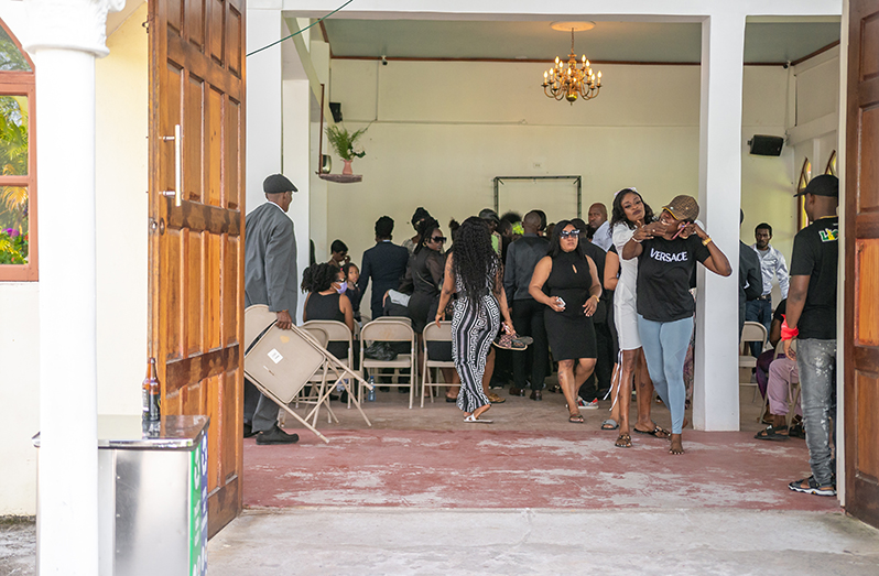 Relatives of Royden ‘Smallie’ Williams at the Memorial Gardens in Le Repentir where a small funeral ceremony was held (Delano Williams photos)