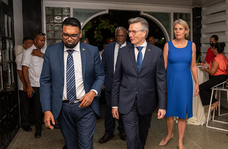 President Dr Irfaan Ali and EU Ambassador to Guyana, René Van Nes, sharing a light moment at a recent event (Guyana Chronicle file photo)