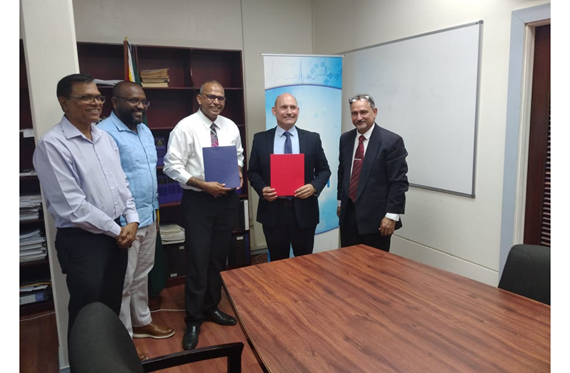 Officials from the Ministry of Health and Cuba following the signing of the agreement