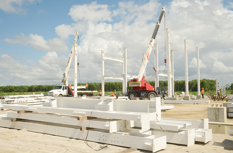 The installation of the Four Points by Sheraton–Marriott Hotel super structure currently taking place (Adrian Narine photo)