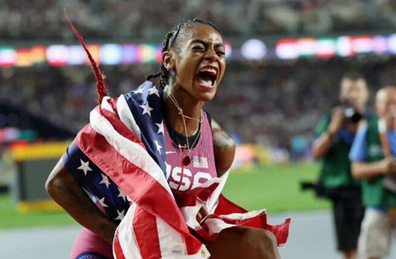 Sha'Carri Richardson exults after her victory (Photo: Steph Chambers/Getty Images)