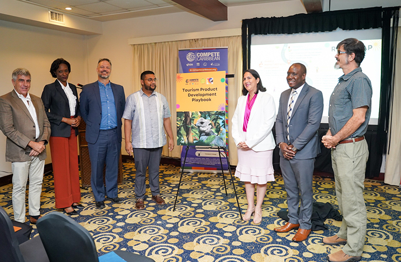 Director of the Guyana Tourism Authority, Kamrul Baksh (foruth from left), President of THAG, Omadelle George (second from left) and other special invitees