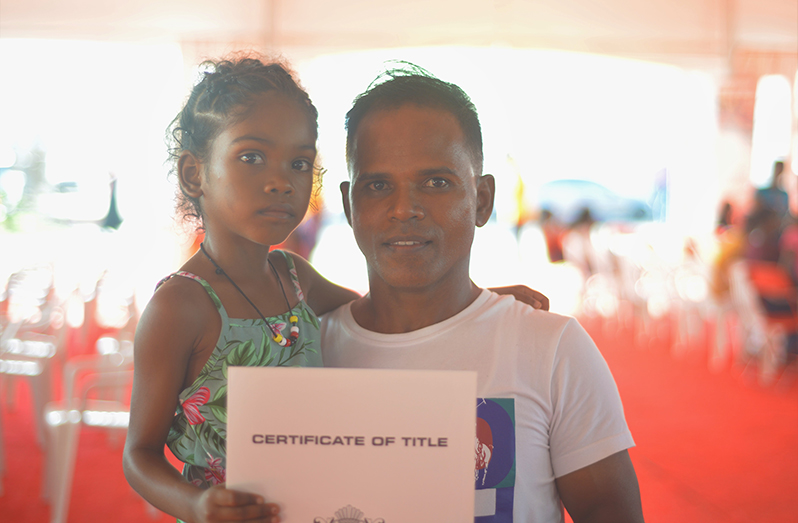 Rajaram Persaud and his six-year-old daughter