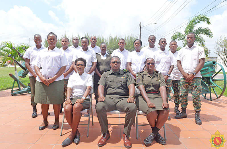 The Twelve soldiers currently undergoing the eight-week training in the grade three chef course, along with senior ranks (seated)