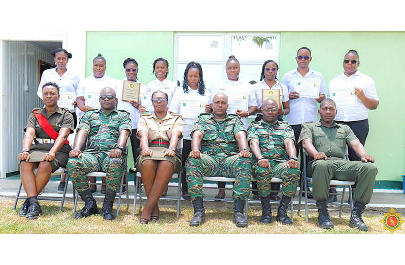 Graduates of the 12-month GDF Garment Construction Course along with senior officers (seated)