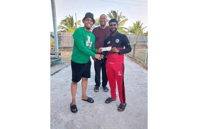 Berbice Under-17 Captain receives the sponsorship from Shimron Hetmyer in the presence of BCB president, Hilbert Foster
