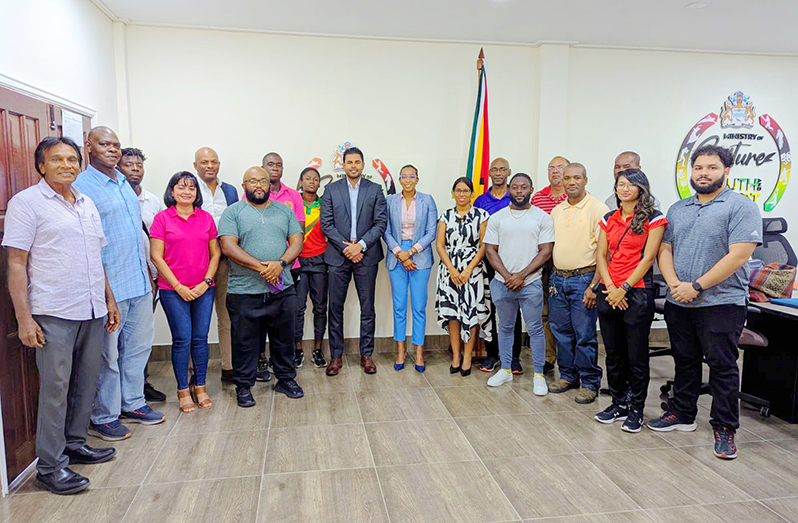 Minister of Culture, Youth and Sport, Charles Ramson Jr. (centre), along with Executives of the National Sports Commission, Guyana Olympic Association, and the athletes and coaches who will represent Guyana at the Pan American Games in Santiago, Chile.