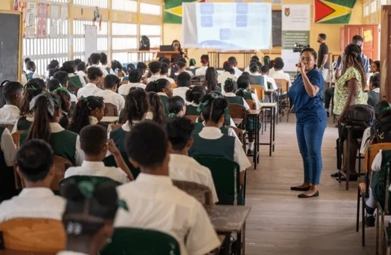 NDMA Assistant ICT Engineer within the Cyber Security Division, Melissa Vandeyar addressing students at the cybersecurity awareness session on Tuesday