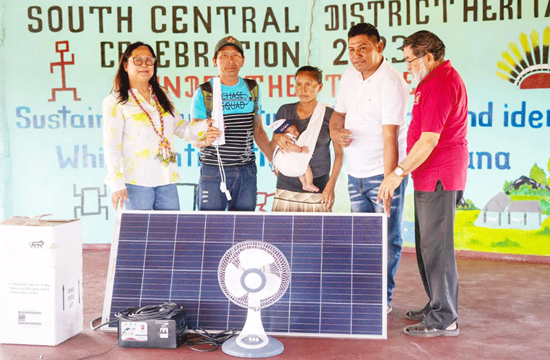 One of the many families that received solar systems