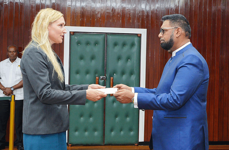 President Dr Irfaan Ali accepting the letters of credence from the new U.S. Ambassador, Nicole D Theriot (Office of the President photo)