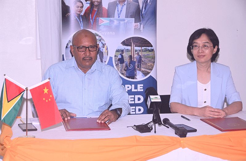 Director General of the CDC, Colonel (ret’d) Nazrul Hussain (left) and China’s Ambassador to Guyana Guo Haiyan at the handing-over ceremony (Adrian Narine photo)