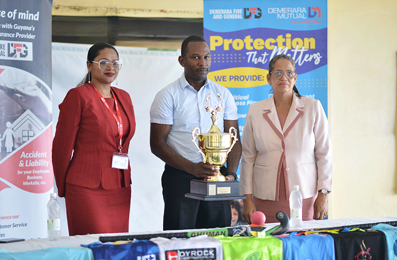 (From left) Hikers President Devin Munroe (centre) poses alongside Global Technology Manager, Jacqueline Weeks (right), and Demerara Fire and General Mutual Limited Marketing Officer, Mina Narine at the official launch of the 3rd edition of the Hikers 7-a side Mixed Hockey Festival