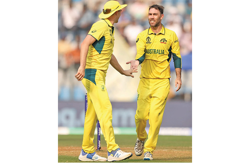 Glenn Maxwell celebrates the wicket of Afghanistan's Rahmat Shah (ICC-Getty)