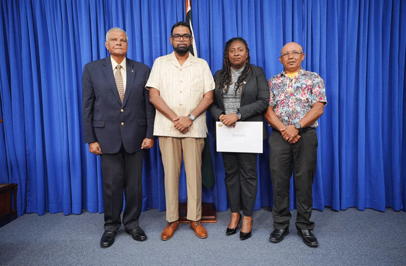 Chairman of the Commission Major-General (Ret’d) Joe Singh (first left); Attorney-at-Law Kim Kyte-Thomas (second right); Chairman of the National Toshaos Council Derrick John (first right); and President Dr. Irfaan Ali (second left)