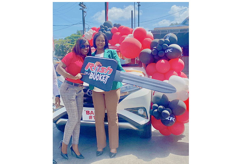 Winner of the KFC Rush for a Bucket promotion, Tiffiny Tyrrell in her new vehicle (Trina Williams photo)